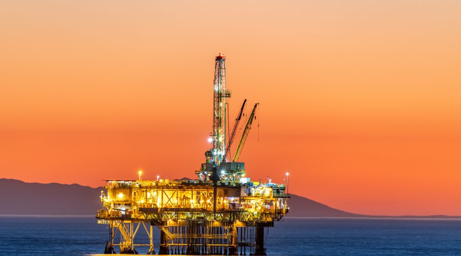 Offshore oil platform at dusk prevent-hazards